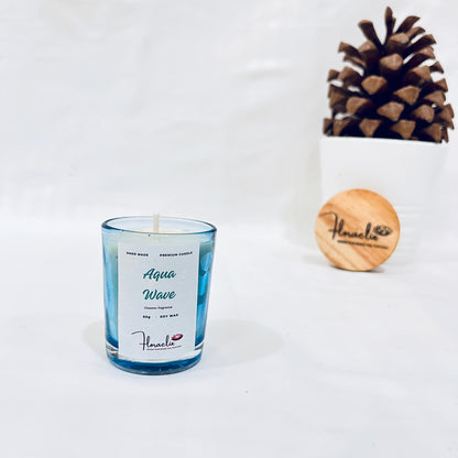 Jaivik Store Aqua Wave soy wax candle, 60g, set in a tranquil pine fruit backdrop, ideal for a calming ambiance