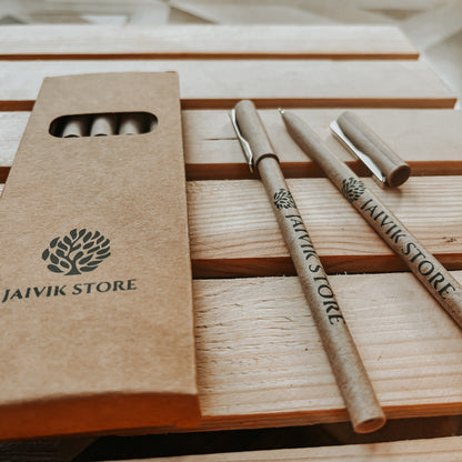 Jaivik Store side view of eco-friendly recycled paper ball pen with blue ink and clip, displayed in outside box packaging