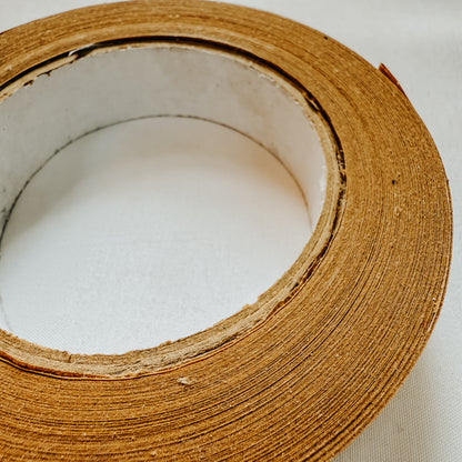 Close-up view of Jaivik Store EcoWrap Brown Kraft Paper Tape, 50m, Self-Adhesive – High-strength, biodegradable kraft tape