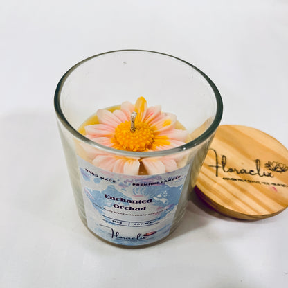 Close-up of Jaivik Store Enchanted Orchard Daisy soy wax candle, 120g, lid open, wick visible for premium detail