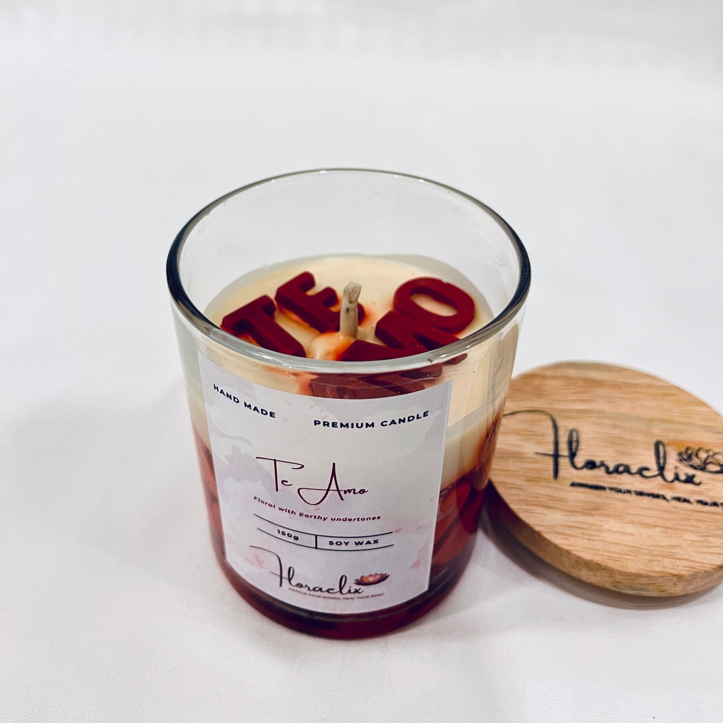 Close-up of Jaivik Store Te Amo scented soy wax jar candle, 150g, with lid open and wick visible for premium detailing